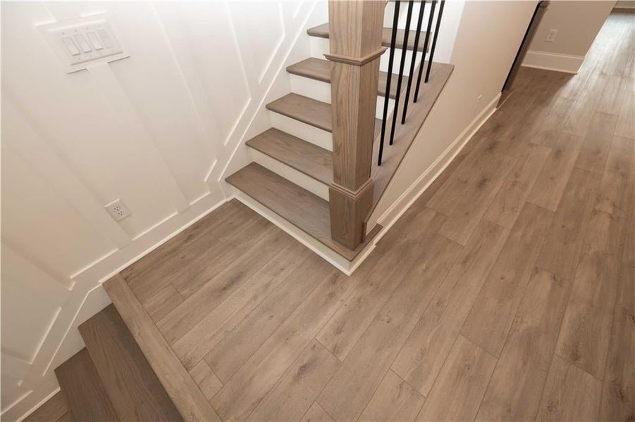 Highlighting hardwood floors and stairs-