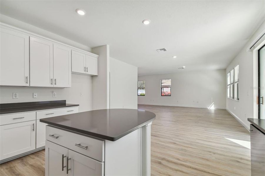 Photos are not the home listed, but same floor plan.