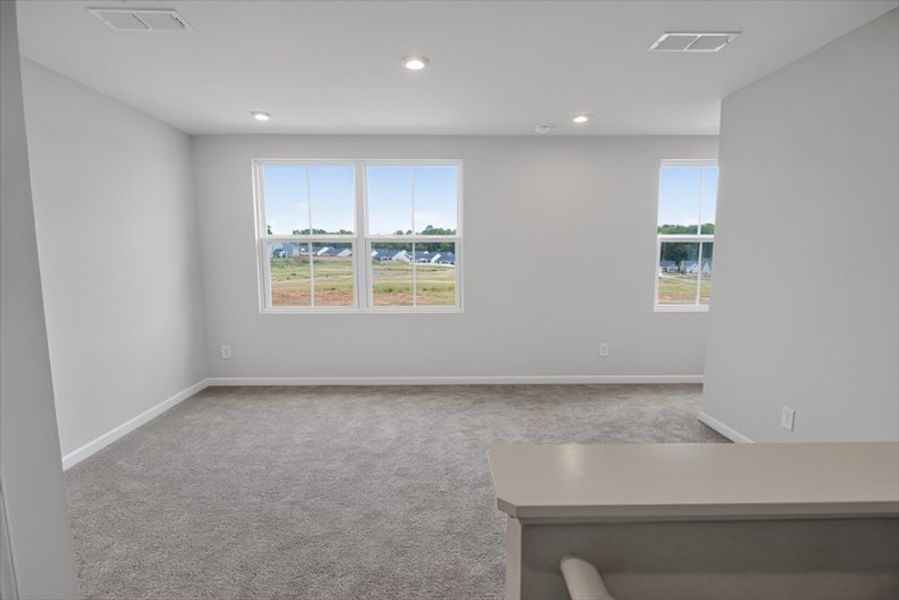 Spacious, unfurnished interior of a new home in Wren Woods 2-Story, Gray Court (Image 25).