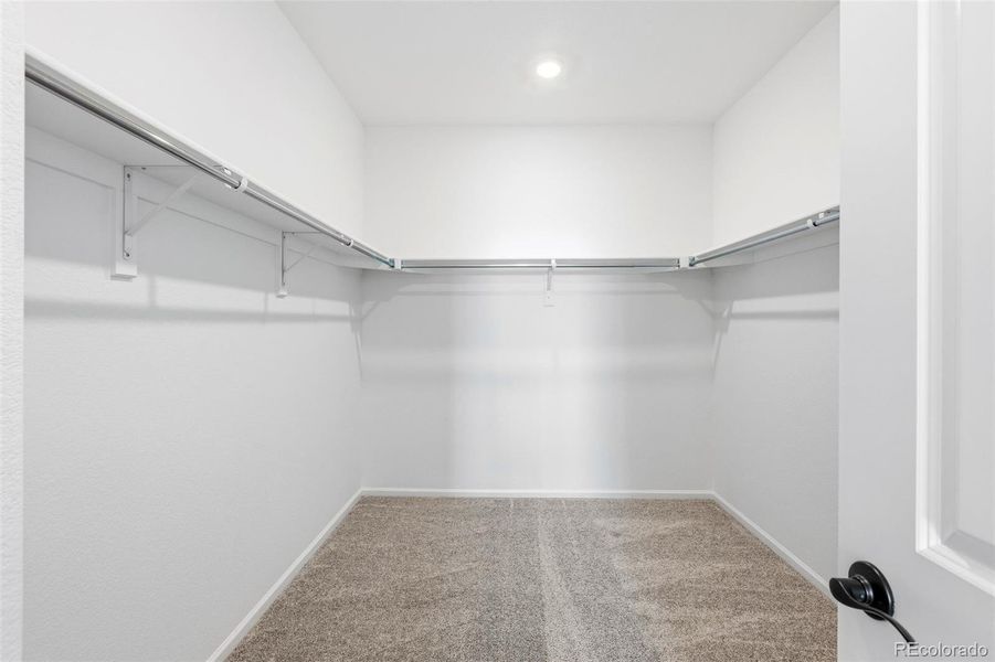 Spacious, unfurnished interior of a new home in The Cottages Collection at Ridgeline Vista, Brighton (Image 21).