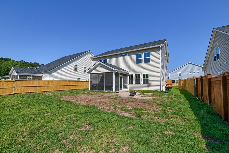 Exterior details and patio area of a home in Heron's Walk at Summers Corner, Summerville (Image 32).
