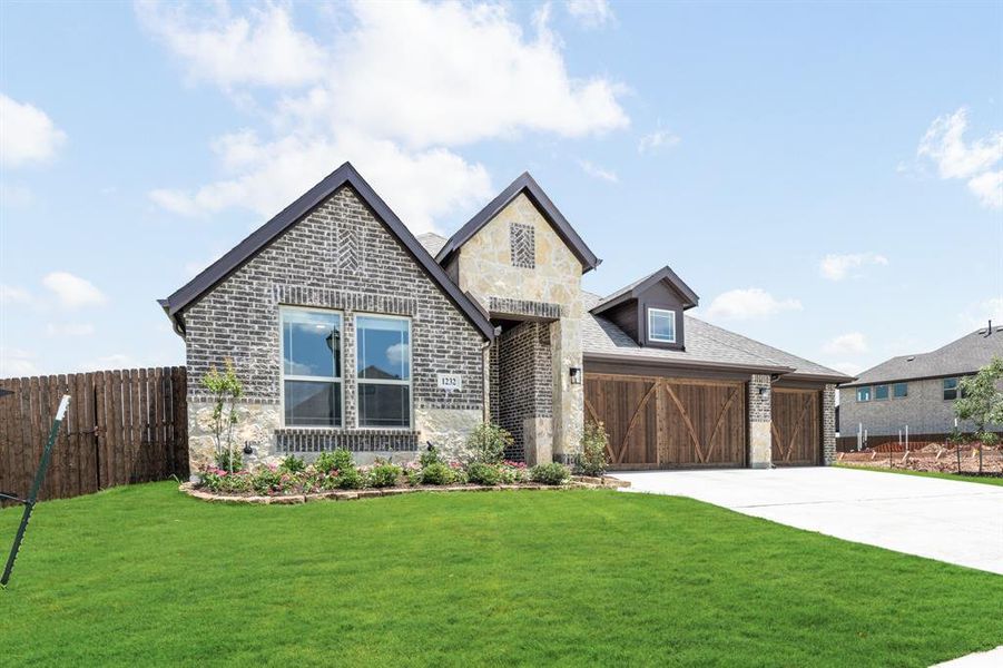 Front exterior of a new home in The Oaks, Red Oak, TX, highlighting curb appeal (Image 24). Front exterior of a new home in The Oaks, Red Oak, TX, highlighting curb appeal (Image 24).