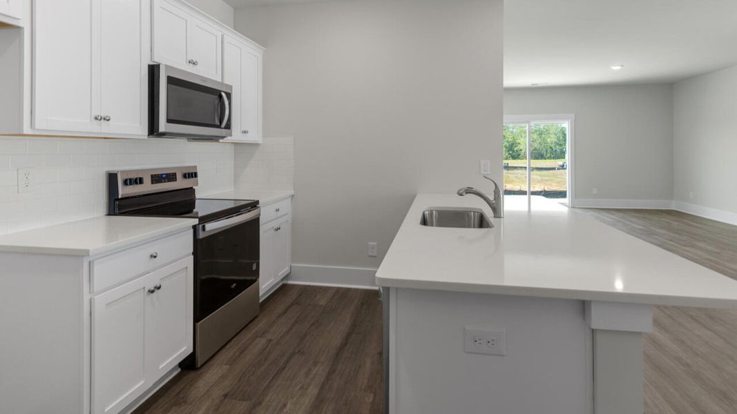 Furnished interior view inside a new home in Indigo Preserve Townhomes, Leland (Image 7).