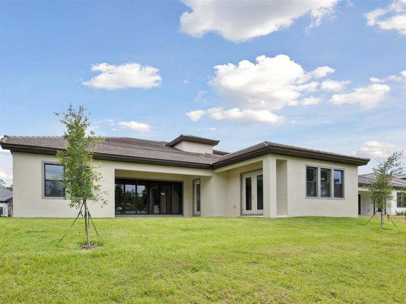 Exterior details and patio area of a home in Hidden Lakes, Brandon (Image 3).