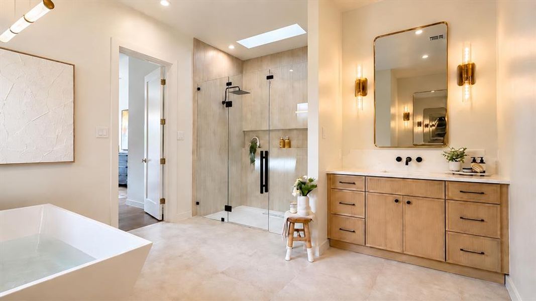 A primary retreat like no other.  Skylight, bodysprays, split vanities, and soaking tub to prepare for an incredible night's sleep.