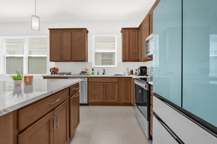 Furnished interior view inside a new home in Tohoqua Reserve, Kissimmee (Image 6).