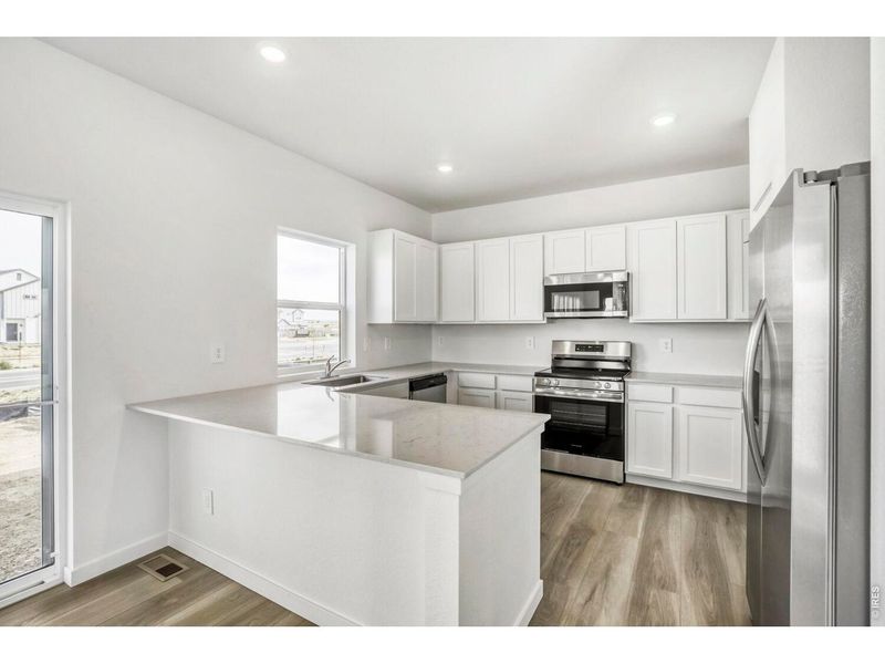 Furnished interior view inside a new home in Kinston, Loveland (Image 6).