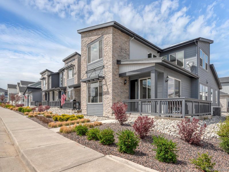 Front exterior of a new home in Green Gables, Denver, CO, highlighting curb appeal (Image 2).