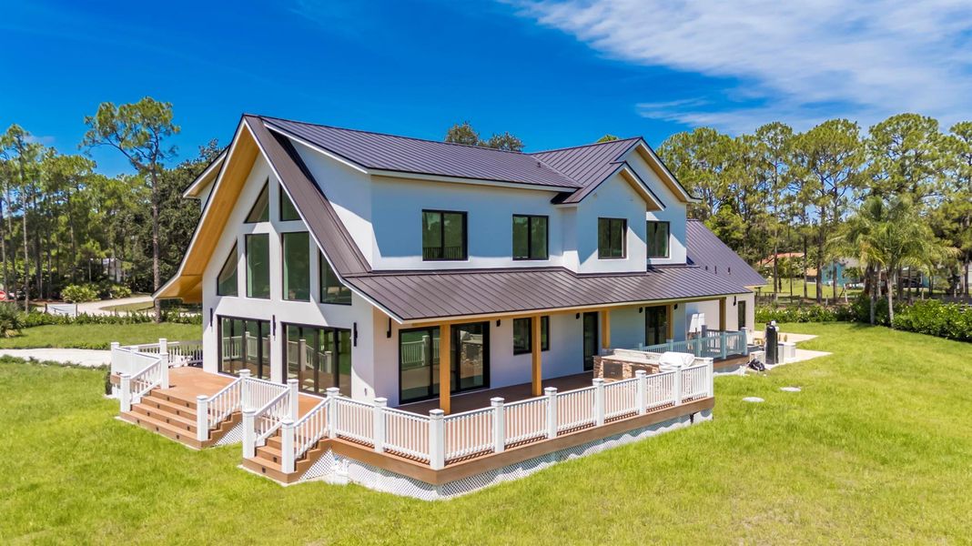 Front exterior of a new home in , Jupiter, FL, highlighting curb appeal (Image 19).