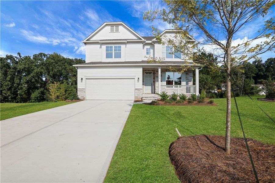 Front exterior of a new home in Cambridge, Flowery Branch, GA, highlighting curb appeal (Image 25). Front exterior of a new home in Cambridge, Flowery Branch, GA, highlighting curb appeal (Image 25).