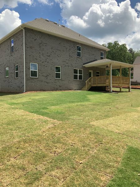 Exterior details and patio area of a home in Mirror Lake at South Harbour, Villa Rica (Image 3). Exterior details and patio area of a home in Mirror Lake at South Harbour, Villa Rica (Image 3).
