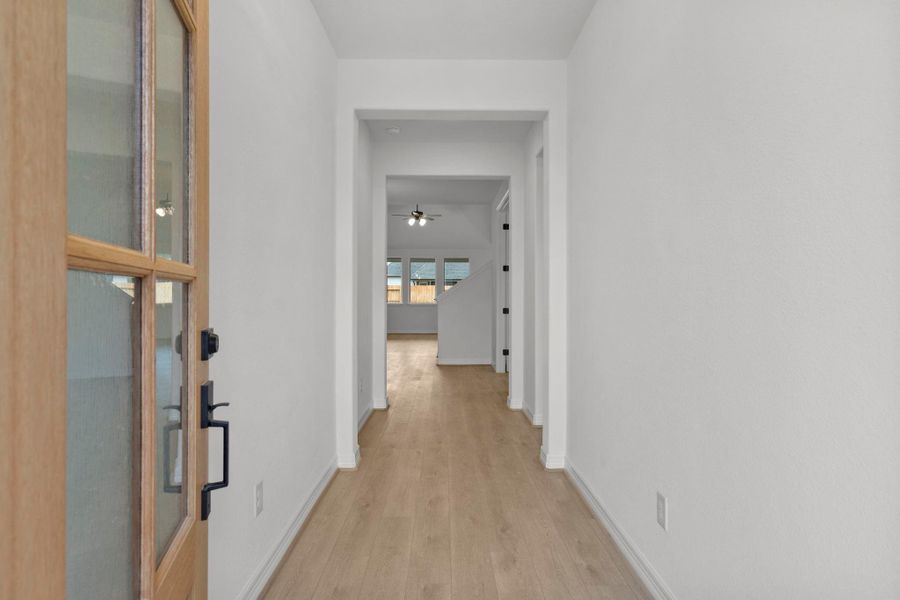 Inviting entryway with a bright, open feel that sets the tone for the home’s thoughtful design.