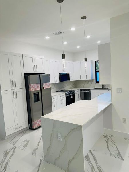 Furnished interior view inside a new home in , Lehigh Acres (Image 10).