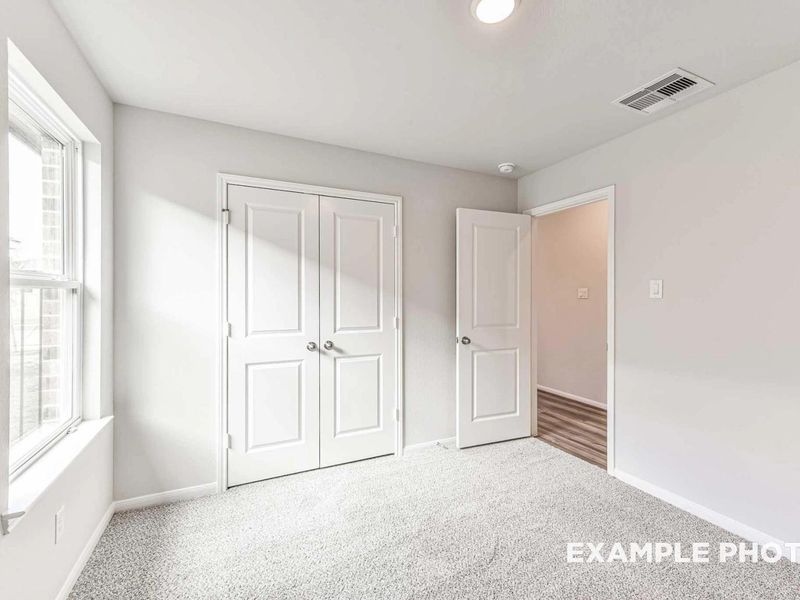 Spacious, unfurnished interior of a new home in Sunterra, Katy (Image 21).