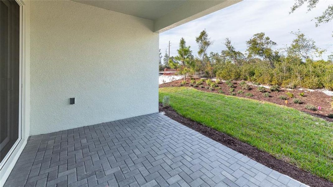 Exterior details and patio area of a home in Cresswind DeLand, Deland (Image 3).