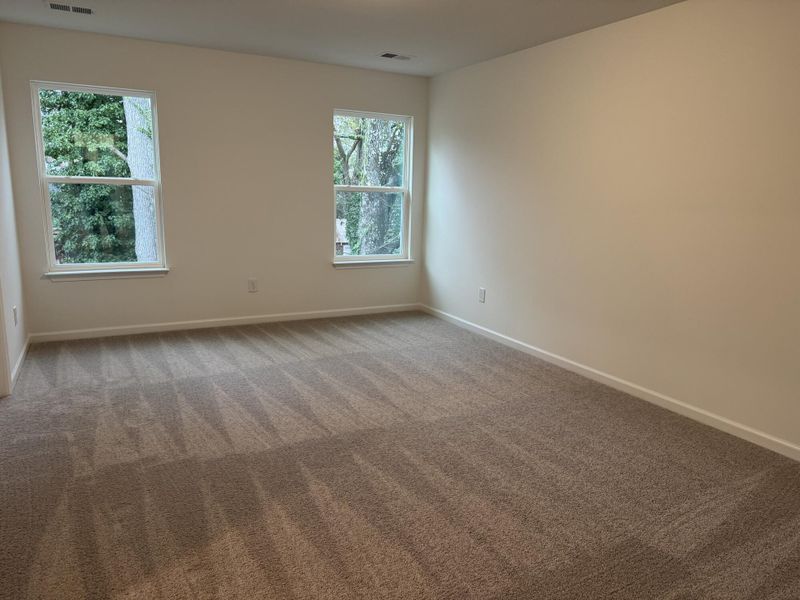 Spacious, unfurnished interior of a new home in East Main Townes, Spartanburg (Image 14).