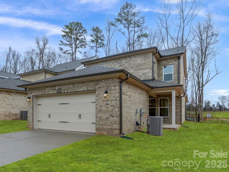 Exterior details and patio area of a home in Whitley Preserve – Park Collection, Mint Hill (Image 3).