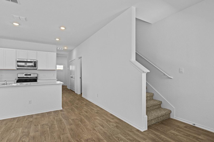 Furnished interior view inside a new home in Valverde, Bastrop (Image 14).