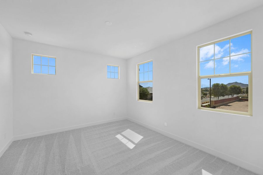 Spacious, unfurnished interior of a new home in Ellsworth Ranch Voyage Collection, Queen Creek (Image 19).