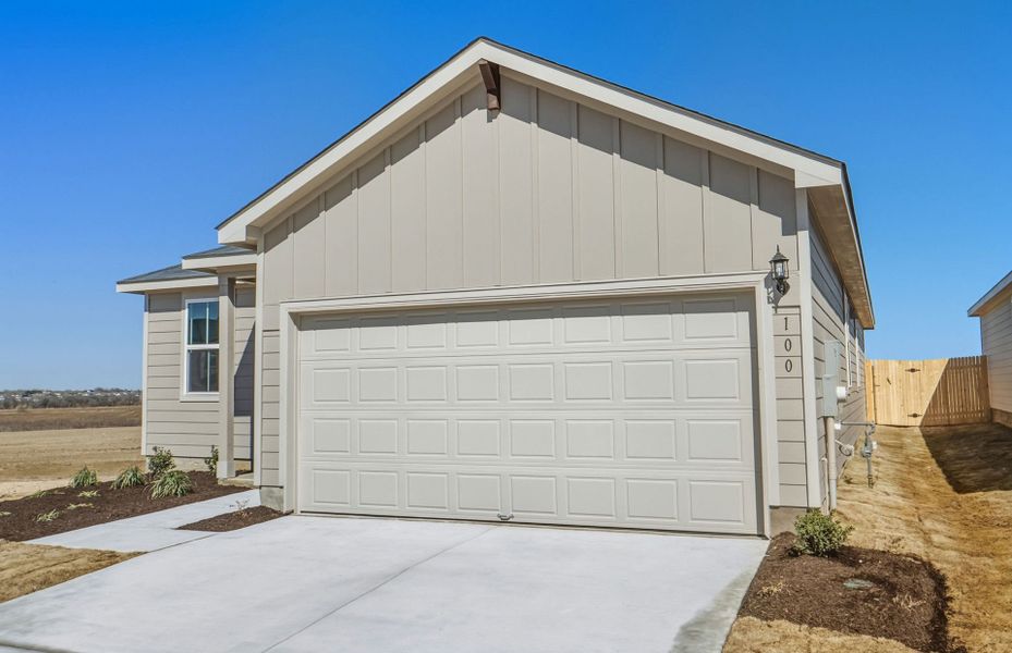 Front exterior of a new home in Larson Crossing, Elgin, TX, highlighting curb appeal (Image 19).