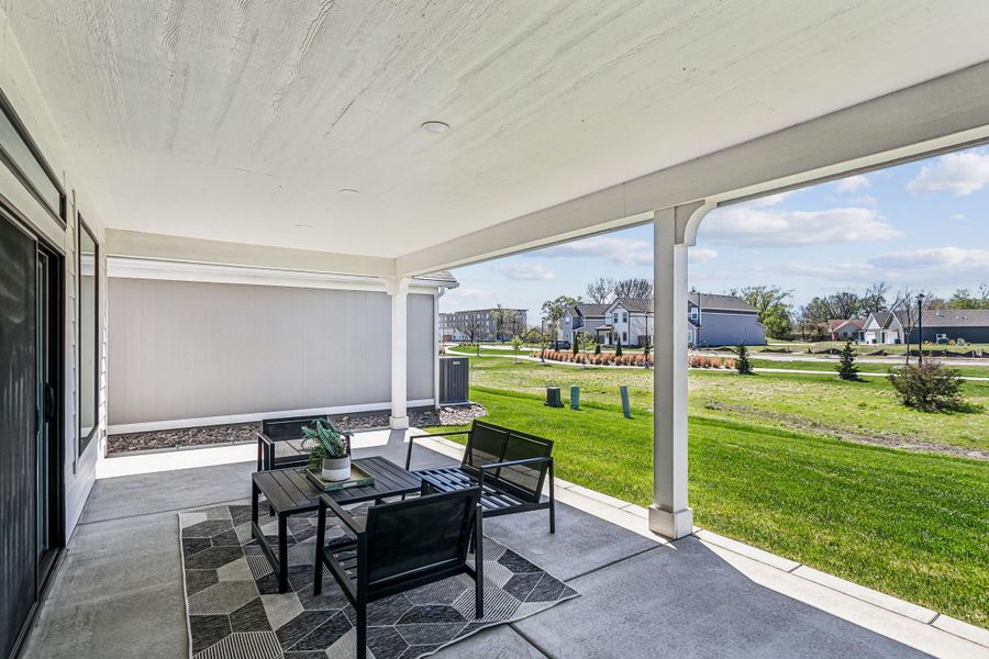 Exterior details and patio area of a home in The Courtyards at The Heritage, Andover (Image 3).