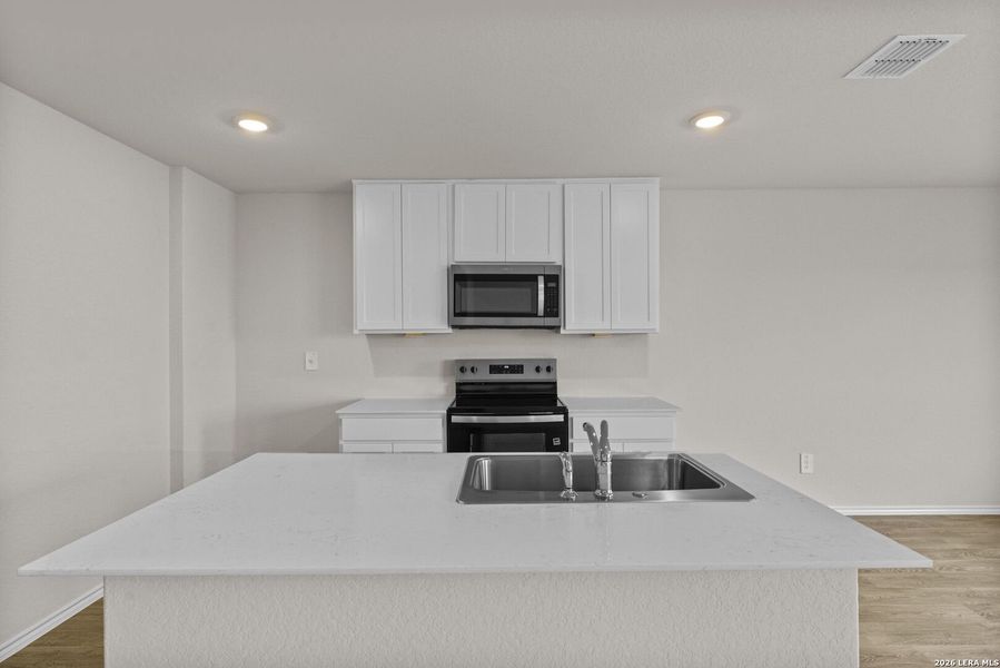 Furnished interior view inside a new home in Swenson Heights, Seguin (Image 8).