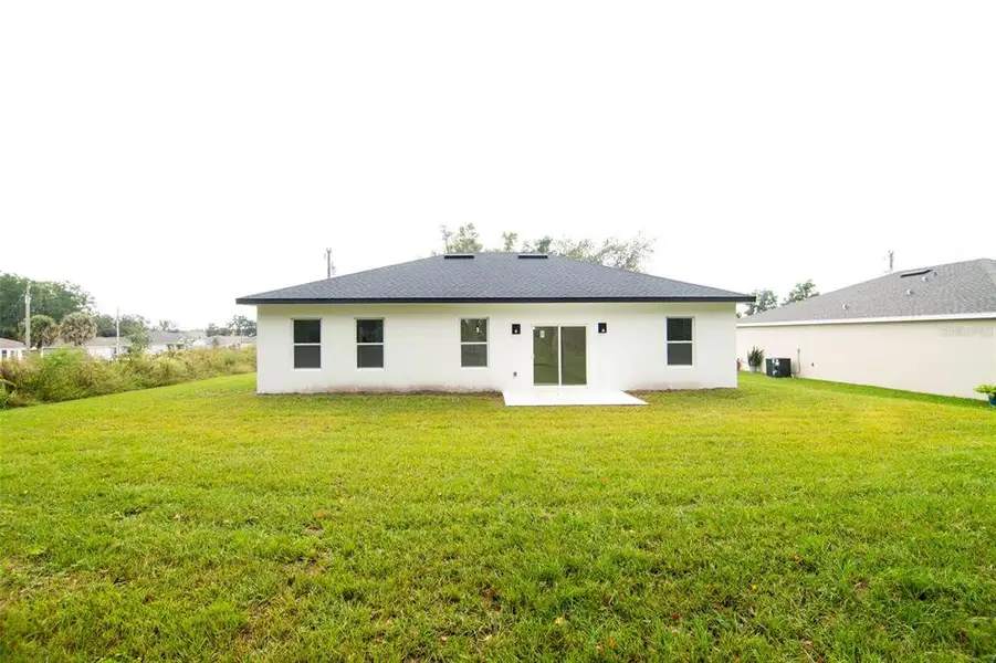 Exterior details and patio area of a home in , Ocala (Image 3).