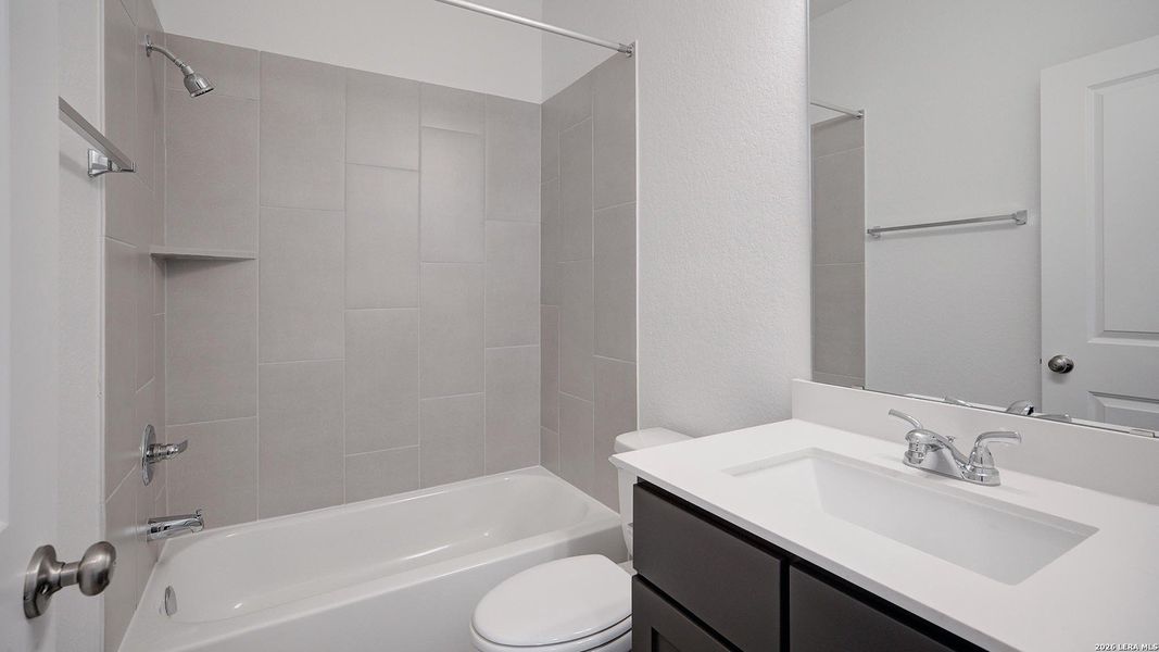 Furnished interior view inside a new home in Ladera, San Antonio (Image 8).