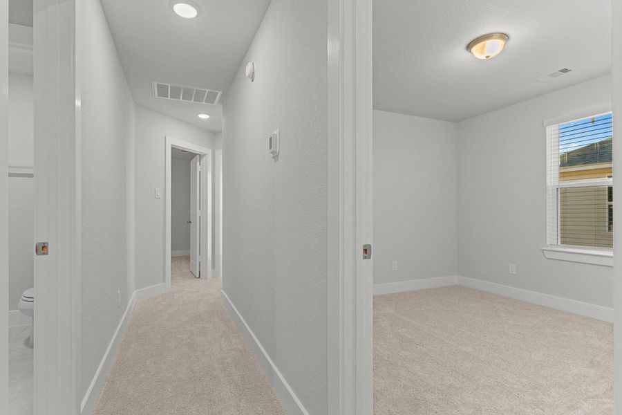 A long hallway leads to additional bedrooms, offering privacy and comfort for everyone in the home. Each room is designed with attention to detail and space for personalization. A long hallway leads to additional bedrooms, offering privacy and comfort for everyone in the home. Each room is designed with attention to detail and space for personalization.