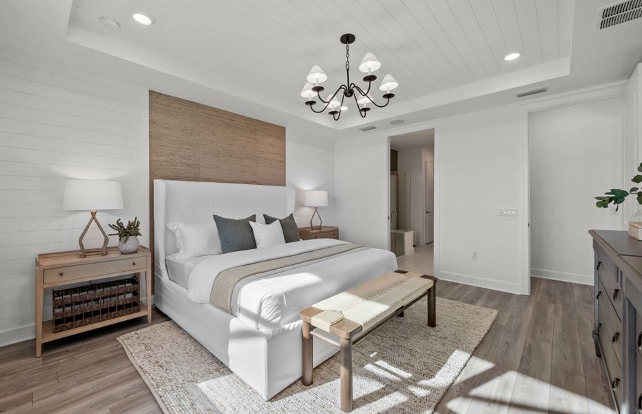 Representative furnished interior of a home built from the Mystique Grande by DiVosta in BeachWalk by Manasota Key, Englewood (Image 13).