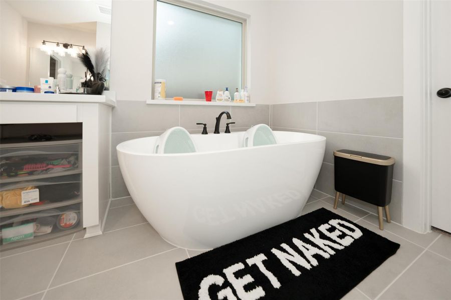 Furnished interior view inside a new home in Elyson, Katy (Image 38).