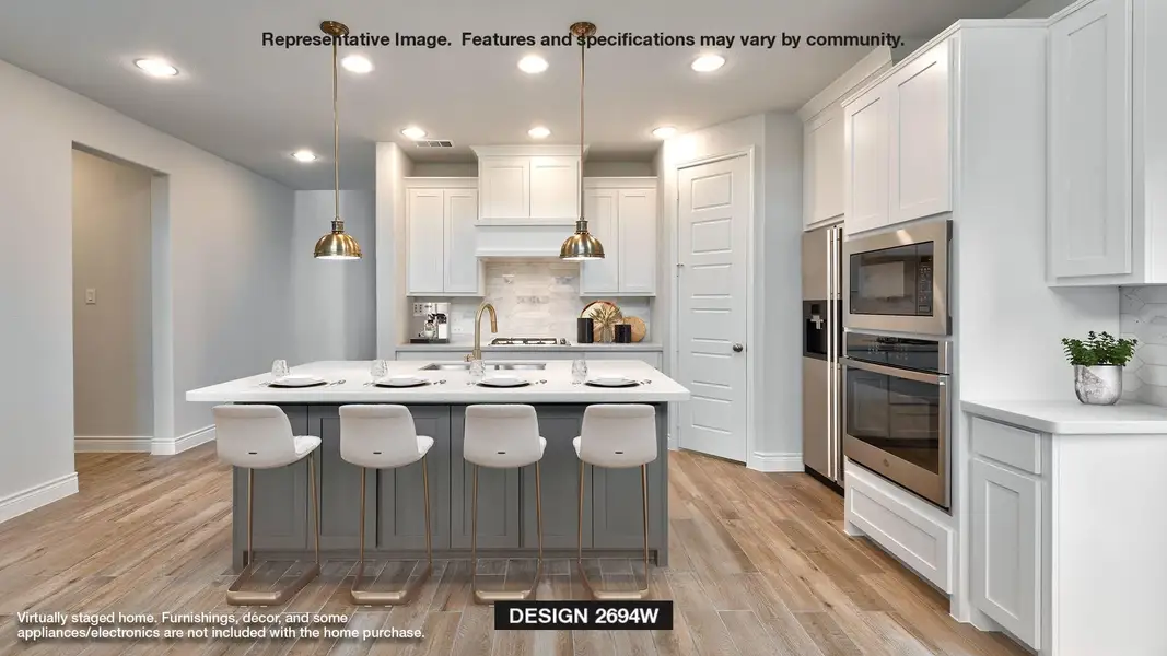 Kitchen featuring stainless steel appliances, decorative backsplash, light wood-type flooring, white cabinets, and recessed lighting