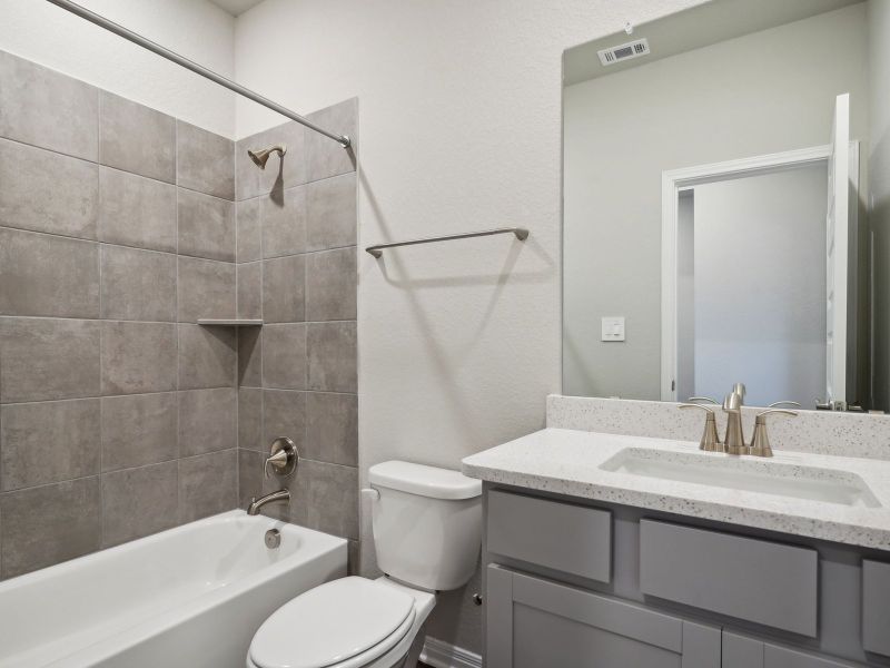 Furnished interior view inside a new home in Turner's Crossing - Reserve Collection, Buda (Image 5).