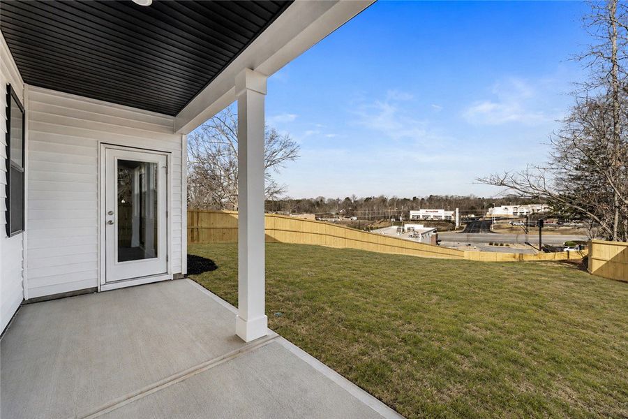 A spacious backyard with a private fence offers am A spacious backyard with a private fence offers am