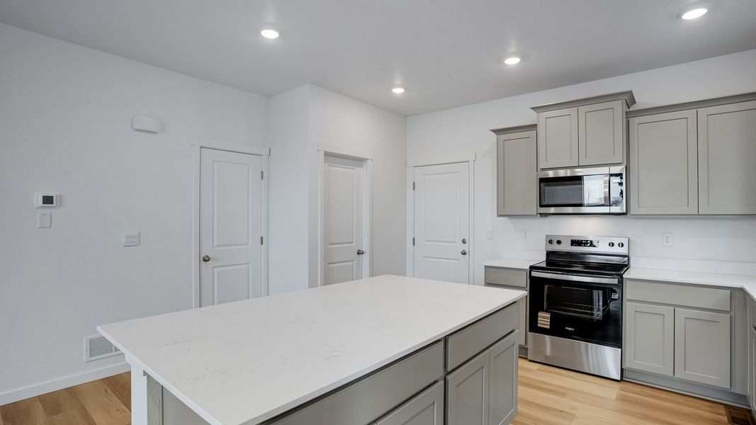 Representative furnished interior of a home built from the Lexington by D.R. Horton in Tailholt, Severance (Image 8).