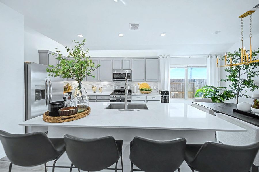 Furnished interior view inside a new home in Pinewood at Grand Texas, New Caney (Image 8).