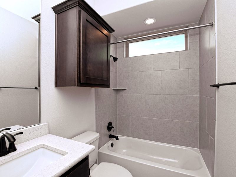 Representative furnished interior of a home built from the Emerald II by Giddens Homes in Riverstone, Georgetown (Image 14).