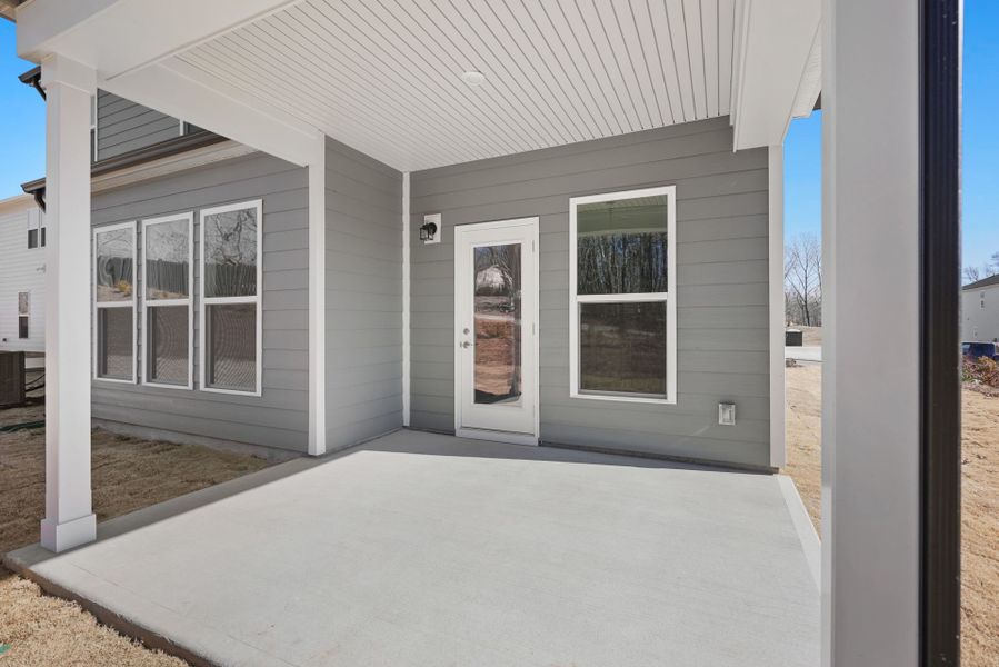 Exterior details and patio area of a home in Elmbrook, Indian Trail (Image 4).