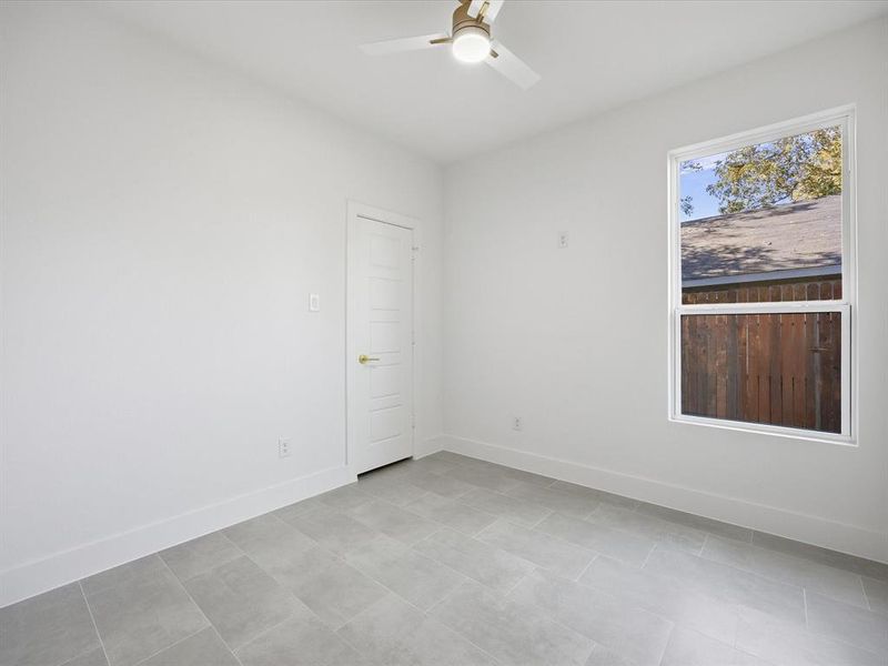 Spare room featuring baseboards