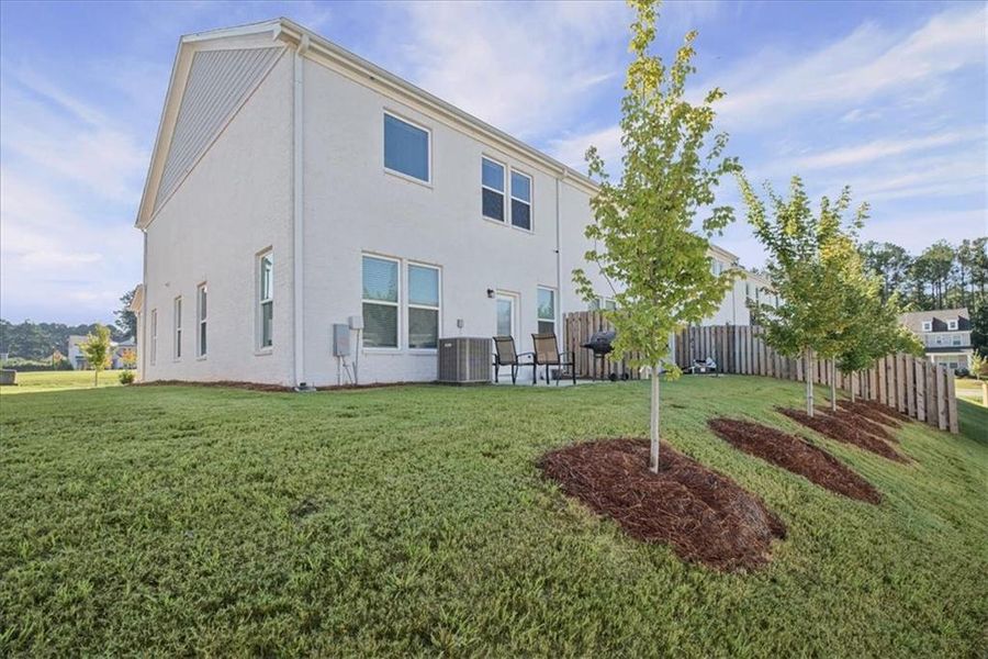 Exterior details and patio area of a home in , McDonough (Image 26).