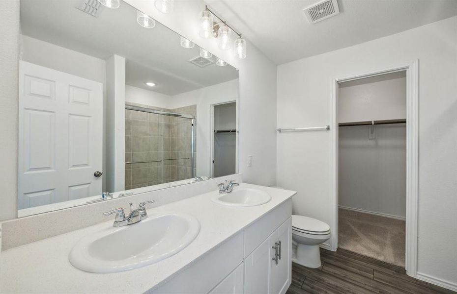 Owner's bath with dual sinks *real home pictured