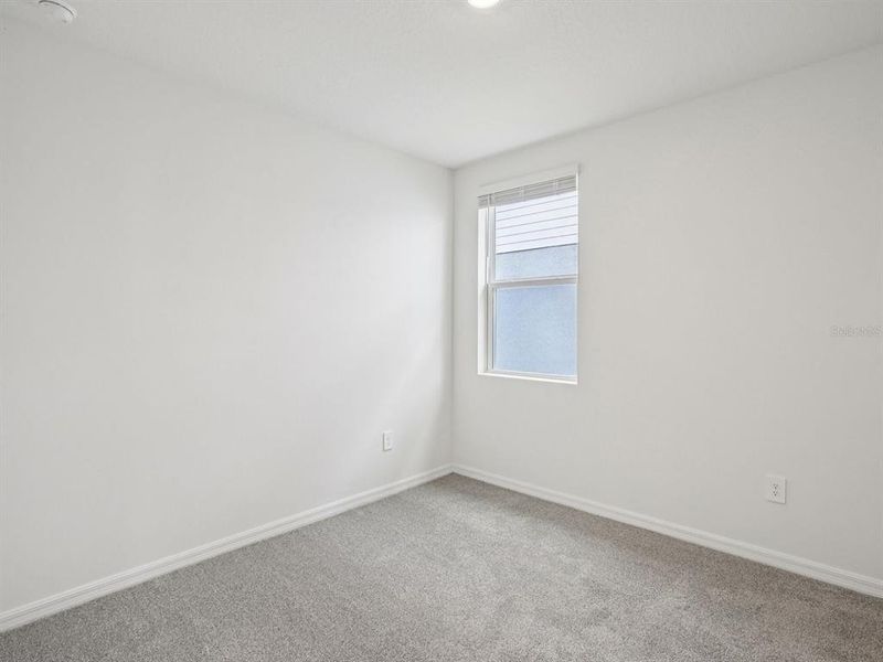 Spacious, unfurnished interior of a new home in Magnolia Bay - Premier Series, Nokomis (Image 10).