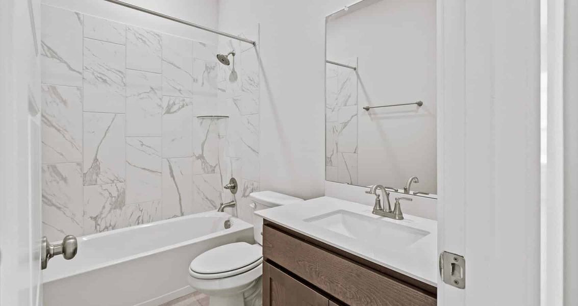 Furnished interior view inside a new home in Trace, San Marcos (Image 8).