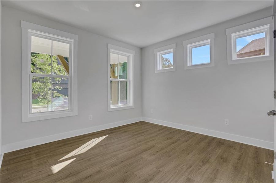 Spacious, unfurnished interior of a new home in The Paddocks at Doc Hughes, Buford (Image 39).