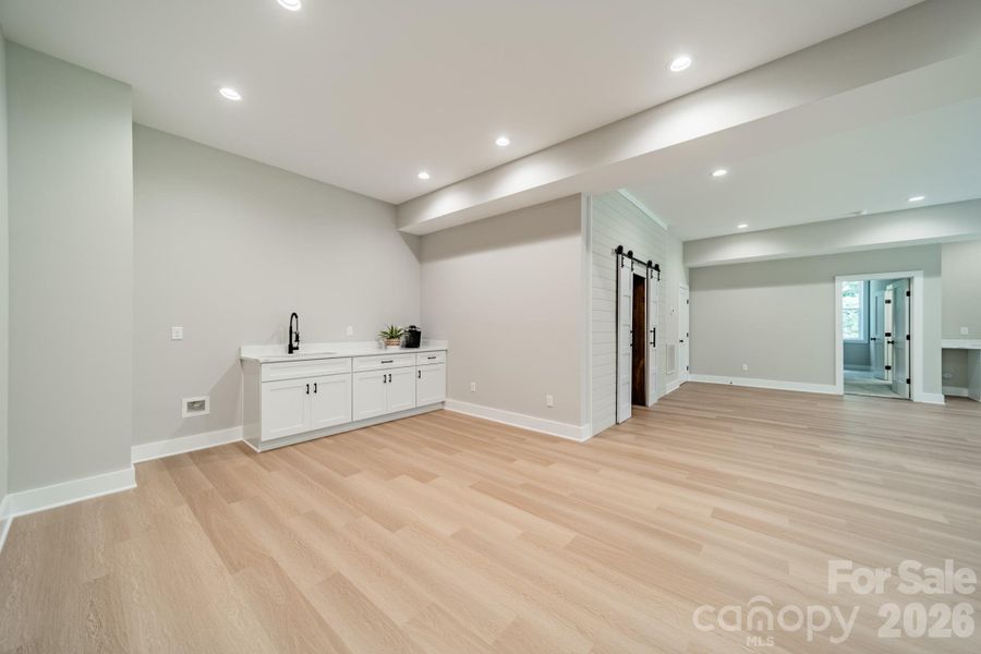 The Lower Level boasts a large Wet Bar or Coffee Bar for entertaining