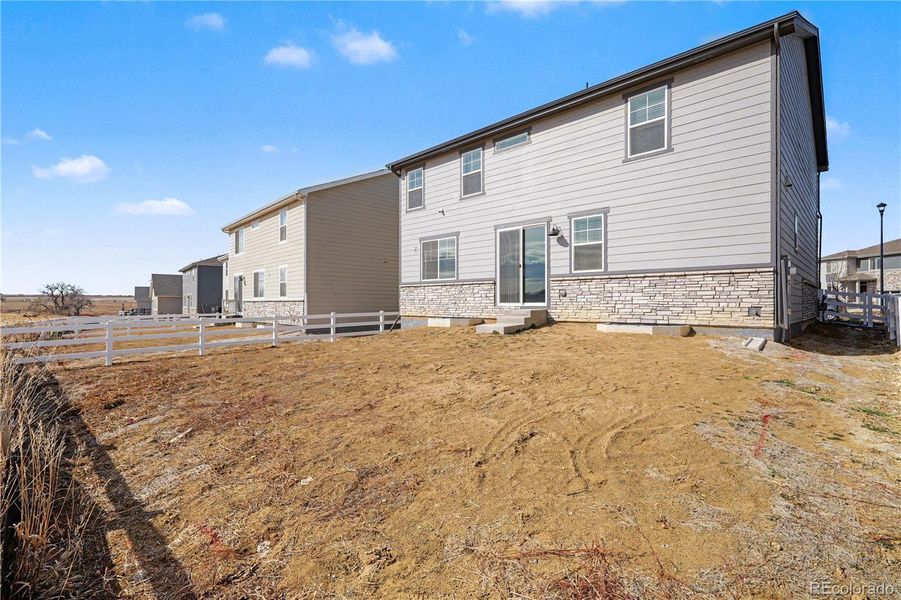 Exterior details and patio area of a home in Murphy Creek, Aurora (Image 4).