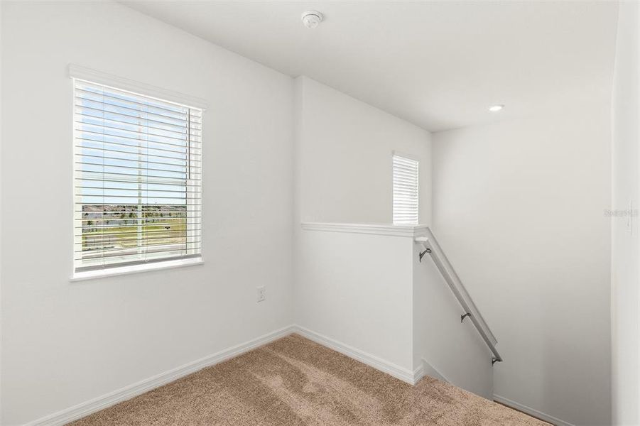 Spacious, unfurnished interior of a new home in Peach Crossings, Winter Haven (Image 19).