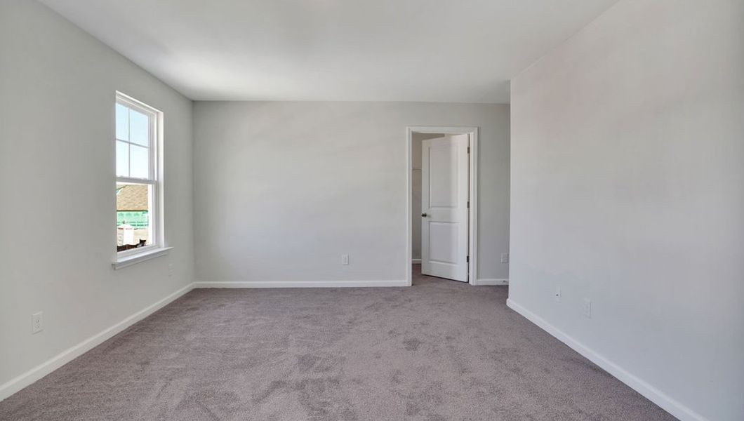 Representative unfurnished interior of a home built from the ROBIE by D.R. Horton in The Pines at Blake Farm, Wilmington (Image 18).
