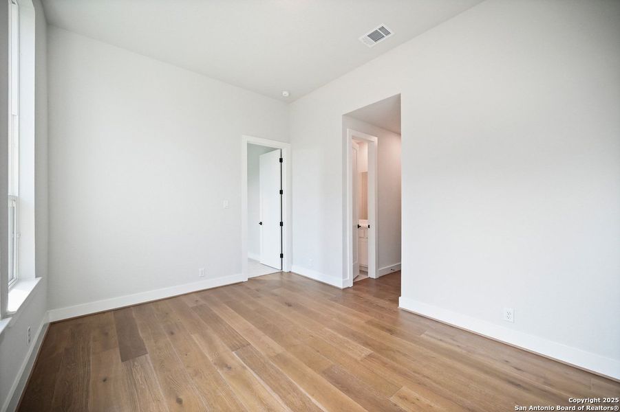 Spacious, unfurnished interior of a new home in Alsatian Oaks: 60ft. lots, Castroville (Image 19).