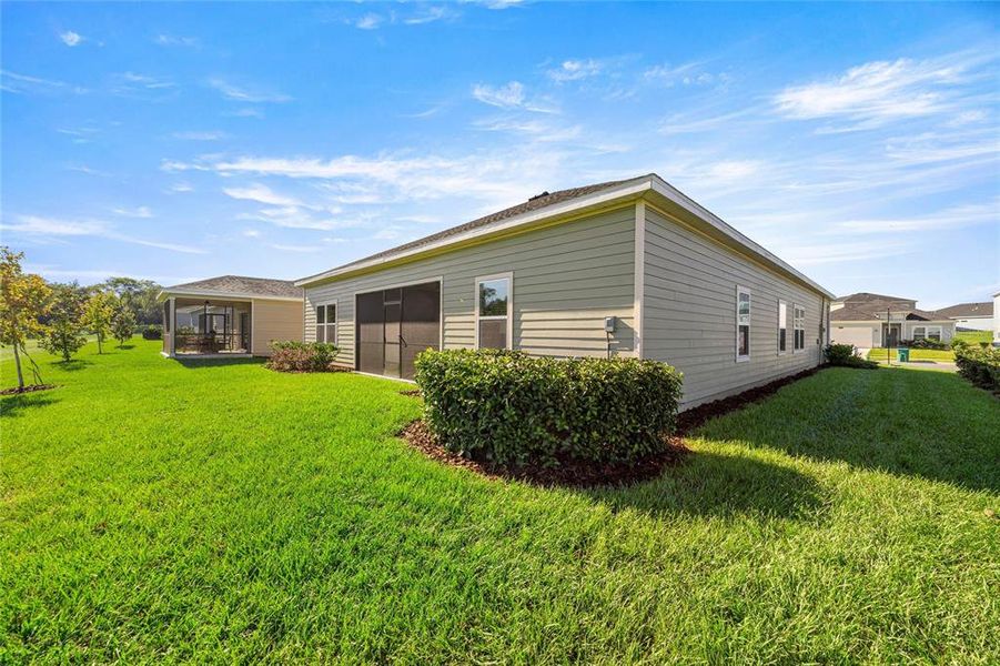 Exterior details and patio area of a home in Trailhead Landing: Trailhead Landing 60s, Alachua (Image 23).